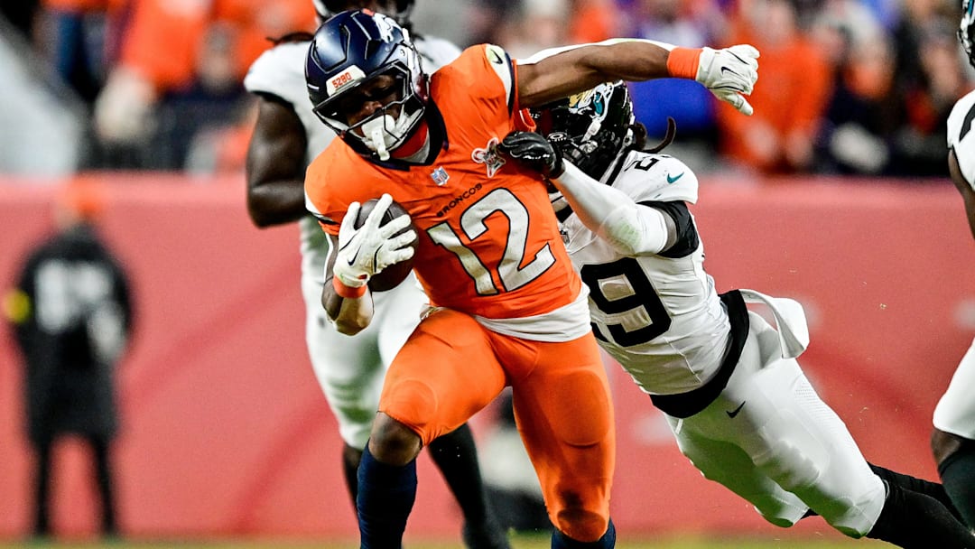 DENVER, CO - DECEMBER 21: Denver Broncos running back RJ Harvey (12) runs after a catch in the fourth quarter during a game between the Jacksonville Jaguars and the Denver Broncos at Empower Field at Mile High on December 21, 2025 in Denver, Colorado.