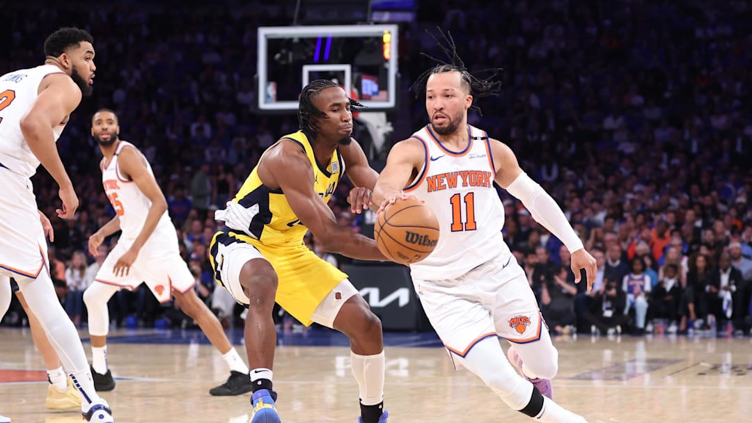 May 21, 2025; New York, New York, USA; New York Knicks guard Jalen Brunson (11) controls the ball against Indiana Pacers forward Aaron Nesmith (23) in the third quarter during game one of the eastern conference finals for the 2025 NBA Playoffs at Madison Square Garden. Mandatory Credit: Wendell Cruz-Imagn Images