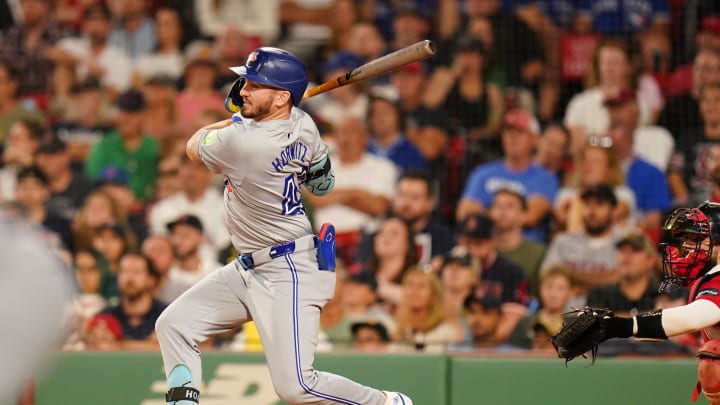 Toronto Blue Jays second baseman Spencer Horwitz (48) hits a singe to left field to drive in a run against the Boston Red Sox in the ninth inning at Fenway Park on Aug 26.