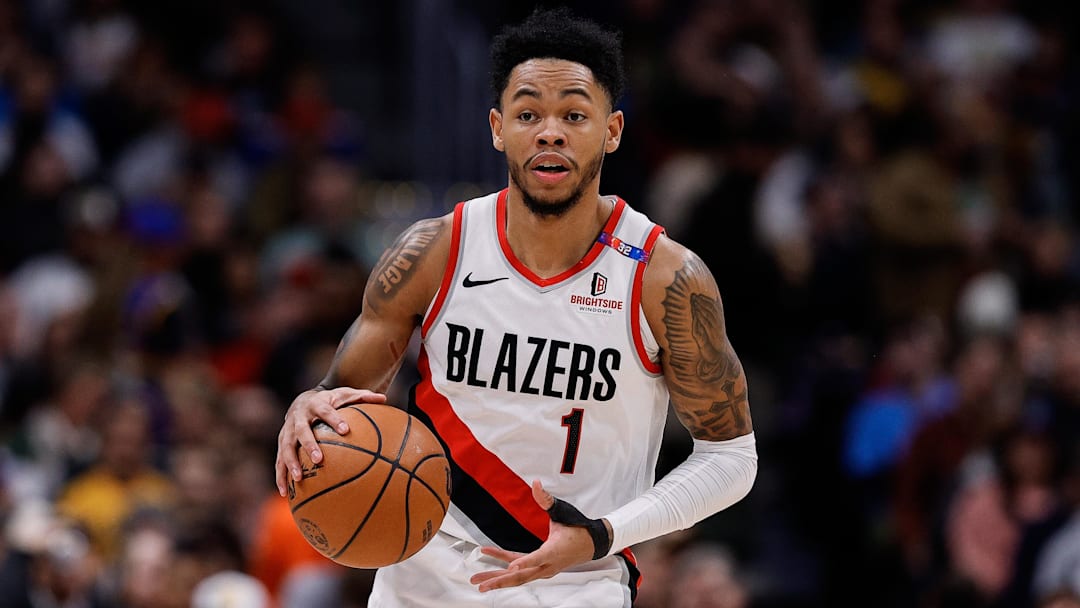 Feb 12, 2025; Denver, Colorado, USA; Portland Trail Blazers guard Anfernee Simons (1) dribbles the ball up court in the first quarter against the Denver Nuggets at Ball Arena. Mandatory Credit: Isaiah J. Downing-Imagn Images