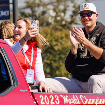 Nov 3, 2023; Arlington, TX, USA; Texas Rangers general manager Chris Young and family during the World Series championship parade at Globe Life Field.  Mandatory Credit: Andrew Dieb-Imagn Images