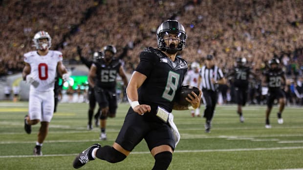 Oregon quarterback Dillon Gabriel scores a touchdown against Ohio State