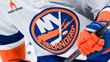 Dec 3, 2024; Montreal, Quebec, CAN; View of a New York Islanders logo on a jersey worn by a member of the team during warm-up before the game against the Montreal Canadiens at Bell Centre. Mandatory Credit: David Kirouac-Imagn Images