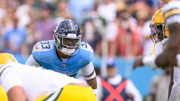 Sep 22, 2024; Nashville, Tennessee, USA;  Tennessee Titans safety Jamal Adams (33) sneaks a peak into the backfield at Nissan Stadium. Mandatory Credit: Steve Roberts-Imagn Images