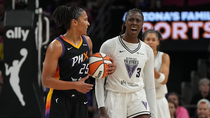 Aug 22, 2025; Phoenix, Arizona, USA; Phoenix Mercury forward Alyssa Thomas (25) and Golden State Valkyries forward Laeticia Amihere (3) talk to each other in the first half at Footprint Center. Mandatory Credit: Rick Scuteri-Imagn Images Aug 22, 2025; Phoenix, Arizona, USA; Phoenix Mercury forward Alyssa Thomas (25) and Golden State Valkyries forward Laeticia Amihere (3) talk to each other in the first half at Footprint Center. Mandatory Credit: Rick Scuteri-Imagn Images