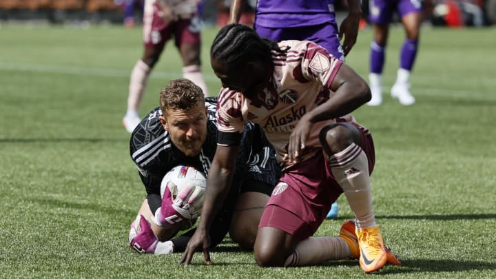 Mar 27, 2022; Portland, Oregon, USA;  Orlando City SC goalkeeper Mason Stajduhar (31) dives to make