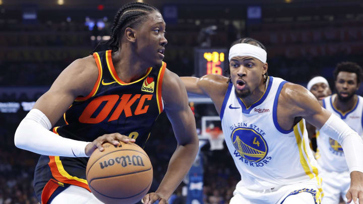 Nov 3, 2023; Oklahoma City, Oklahoma, USA; Oklahoma City Thunder forward Jalen Williams (8) drives to the basket around Golden State Warriors guard Moses Moody (4) during the second quarter at Paycom Center. Mandatory Credit: Alonzo Adams-USA TODAY Sports