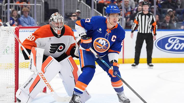 Apr 3, 2026; Elmont, New York, USA; Philadelphia Flyers goaltender Dan Vladar (80) and New York Islanders forward Anders Lee (27) wait for the puck during the second period at UBS Arena. Apr 3, 2026; Elmont, New York, USA; Philadelphia Flyers goaltender Dan Vladar (80) and New York Islanders forward Anders Lee (27) wait for the puck during the second period at UBS Arena.