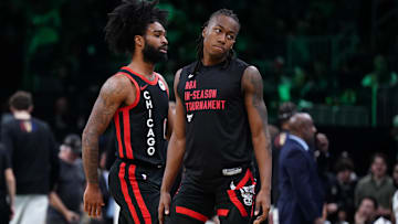 Nov 28, 2023; Boston, Massachusetts, USA; Chicago Bulls guard Ayo Dosunmu (12) and guard Coby White (0)  David Butler II-Imagn Images
