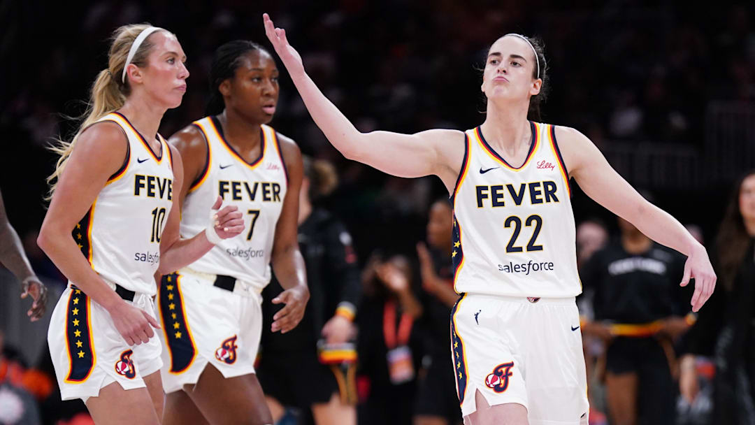 Jul 15, 2025; Boston, Massachusetts, USA; Indiana Fever guard Caitlin Clark (22) reacts to the crowd as they take on the Connecticut Sun in the first quarter at TD Garden. Mandatory Credit: David Butler II-Imagn Images
