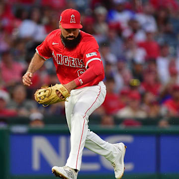 August 16, 2024; Anaheim, California, USA; Los Angeles Angels third baseman Anthony Rendon (6) misplays the RBI single of Atlanta Braves left fielder Jarred Kelenic (24) during the fourth inning at Angel Stadium. Mandatory Credit: Gary A. Vasquez-Imagn Images
