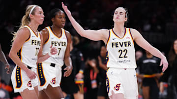 Jul 15, 2025; Boston, Massachusetts, USA; Indiana Fever guard Caitlin Clark (22) reacts to the crowd as they take on the Connecticut Sun in the first quarter at TD Garden. Mandatory Credit: David Butler II-Imagn Images