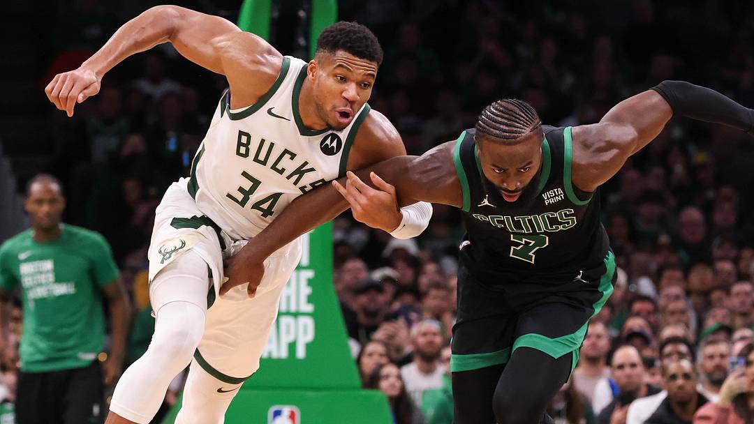 Nov 22, 2023; Boston, Massachusetts, USA; Milwaukee Bucks forward Giannis Antetokounmpo (34) and Boston Celtics forward Jaylen Brown (7) fight for the ball during the second half at TD Garden. Mandatory Credit: Paul Rutherford-Imagn Images Nov 22, 2023; Boston, Massachusetts, USA; Milwaukee Bucks forward Giannis Antetokounmpo (34) and Boston Celtics forward Jaylen Brown (7) fight for the ball during the second half at TD Garden. Mandatory Credit: Paul Rutherford-Imagn Images
