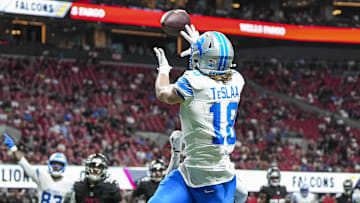 Aug 8, 2025; Atlanta, Georgia, USA; Detroit Lions wide receiver Isaac TeSlaa (18) catches a touchdown pass behind Atlanta Falcons cornerback Dee Alford (20) during the second quarter at Mercedes-Benz Stadium. Mandatory Credit: Dale Zanine-Imagn Images