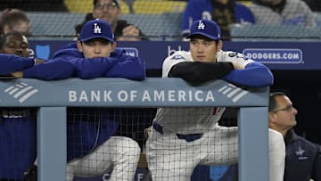 Los Angeles Dodgers starting pitcher Roki Sasaki (11) and designated hitter Shohei Ohtani (17)