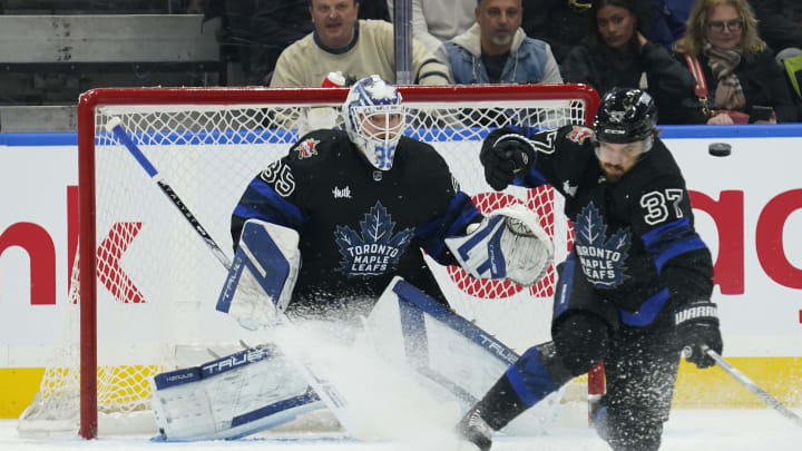 Jan 24, 2024; Toronto, Ontario, CAN; Toronto Maple Leafs defenseman Timothy Liljegren (37) tries to