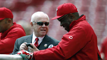 Cincinnati, OH, USA; Cincinnati Reds general manager Walt Jocketty and manager Dusty Baker (12) talk during batting practice against the Los Angeles Angels at Great American Ball Park.