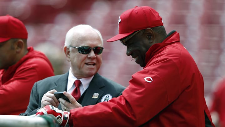 Cincinnati, OH, USA; Cincinnati Reds general manager Walt Jocketty and manager Dusty Baker (12) talk during batting practice against the Los Angeles Angels at Great American Ball Park.