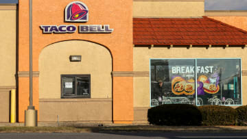 View of a Taco Bell restaurant sign and logo...