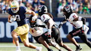 Notre Dame tight end Eli Raridon (9) runs with the ball in the first half of an NCAA football game against NC State at Notre Dame Stadium on Saturday, Oct. 11, 2025, in South Bend.