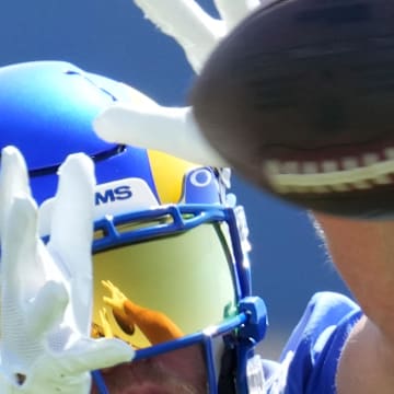 Cooper Kupp catches a pass during the Rams' minicamp in 2022.