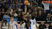 Apr 5, 2025; San Antonio, TX, USA; Houston Cougars forward J'Wan Roberts (13) shoots the ball over Duke Blue Devils center Khaman Maluach (9) during the first half in the semifinals of the men's Final Four of the 2025 NCAA Tournament at Alamodome. Mandatory Credit: Scott Wachter-Imagn Images