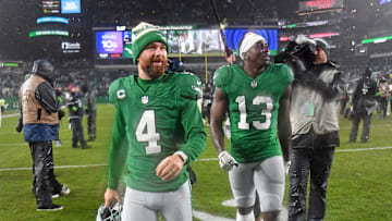 Nov 26, 2023; Philadelphia, Pennsylvania, USA;Philadelphia Eagles place kicker Jake Elliott (4) and wide receiver Olamide Zaccheaus (13) walk off the field after overtime win against the Buffalo Bills  at Lincoln Financial Field. Mandatory Credit: Eric Hartline-Imagn Images
