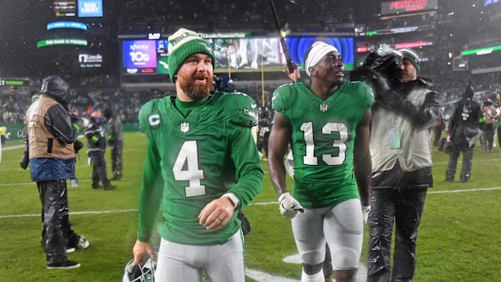 Nov 26, 2023; Philadelphia, Pennsylvania, USA;Philadelphia Eagles place kicker Jake Elliott (4) and wide receiver Olamide Zaccheaus (13) walk off the field after overtime win against the Buffalo Bills  at Lincoln Financial Field. Mandatory Credit: Eric Hartline-Imagn Images