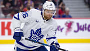Sep 24, 2024; Ottawa, Ontario, CAN; Toronto Maple Leafs defenseman Dakota Mermis (36) follows the puck in the first period against the Ottawa Senators at the Canadian Tire Centre. Mandatory Credit: Marc DesRosiers-Imagn Images