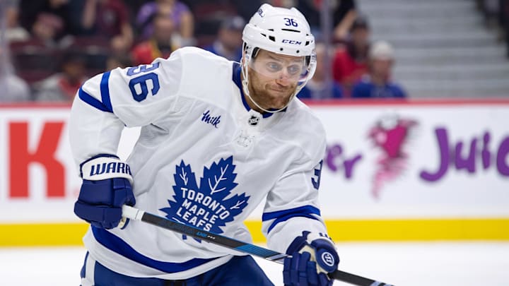 Sep 24, 2024; Ottawa, Ontario, CAN; Toronto Maple Leafs defenseman Dakota Mermis (36) follows the puck in the first period against the Ottawa Senators at the Canadian Tire Centre. Mandatory Credit: Marc DesRosiers-Imagn Images