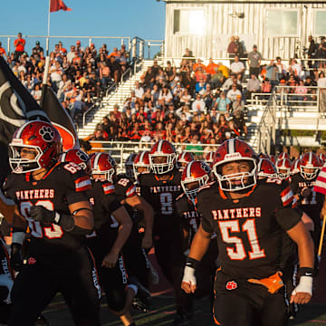 The Central York football team enters the field for a game against Manheim Township on Friday, Aug. 29, 2025. Central York won 36-28.
