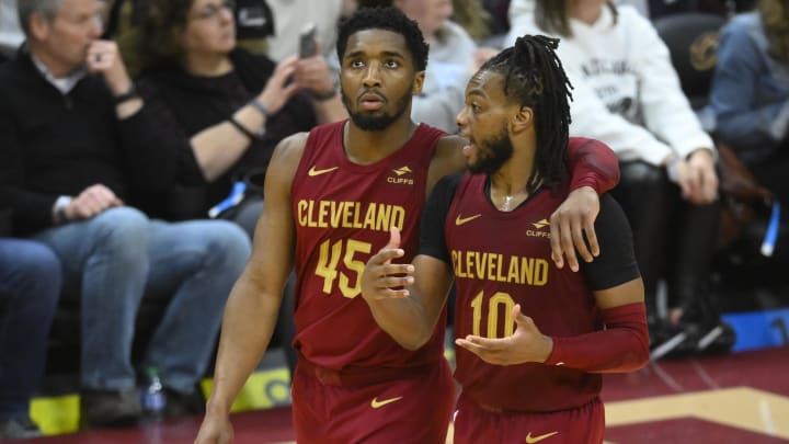 Apr 12, 2024; Cleveland, Ohio, USA; Cleveland Cavaliers guard Donovan Mitchell (45) and guard Darius Garland (10) talk in the fourth quarter against the Indiana Pacers at Rocket Mortgage FieldHouse. Mandatory Credit: David Richard-USA TODAY Sports