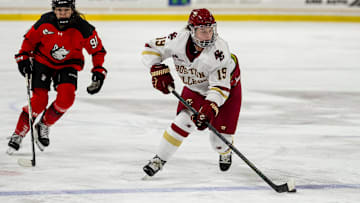 Boston College defender Jade Arnone corrals the puck against Northeastern on Saturday. The Eagles ended up losing 5-4 in overtime.