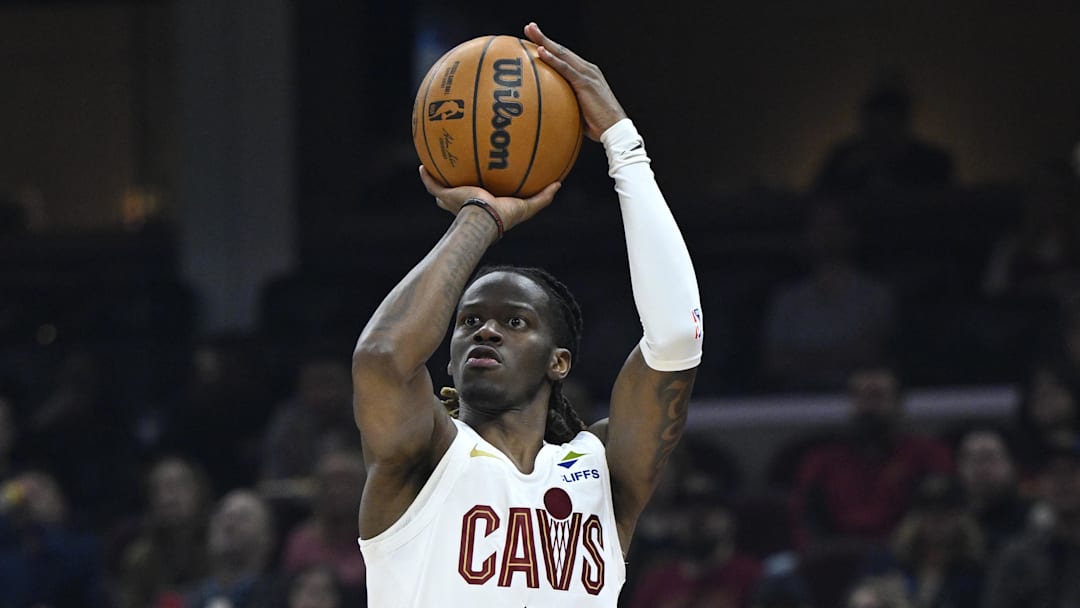 Apr 8, 2026; Cleveland, Ohio, USA; Cleveland Cavaliers guard Keon Ellis (14) shoots in the third quarter against the Atlanta Hawks at Rocket Arena. Mandatory Credit: David Richard-Imagn Images