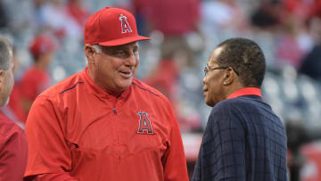 Apr 25, 2017; Anaheim, CA, USA; Los Angeles Angels manager Mike Scioscia (left) shakes hands with Rod Carew during a MLB baseball game between the Oakland Athletics and the Angels at Angel Stadium of Anaheim. Mandatory Credit: Kirby Lee-USA TODAY Sports