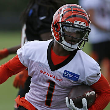 Cincinnati Bengals wide receiver Ja'Marr Chase (1) runs down field after a catch during a training camp practice at the Paul Brown stadium practice facility in downtown Cincinnati on Wednesday, Aug. 18, 2021.