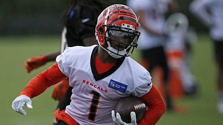 Cincinnati Bengals wide receiver Ja'Marr Chase (1) runs down field after a catch during a training camp practice at the Paul Brown stadium practice facility in downtown Cincinnati on Wednesday, Aug. 18, 2021.