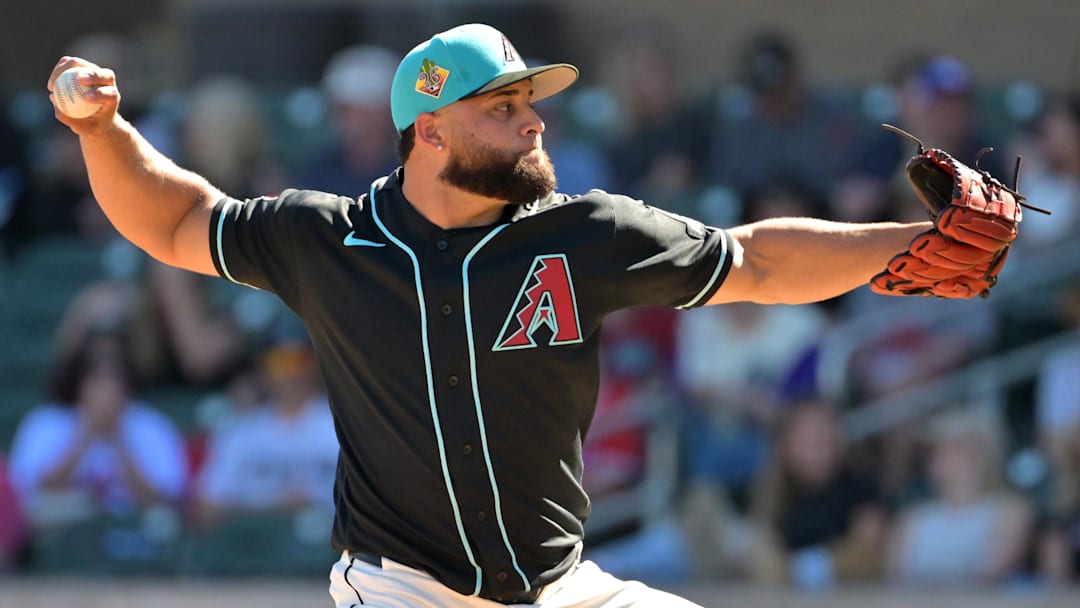 Feb 22, 2026; Salt River Pima-Maricopa, Arizona, USA; Arizona Diamondbacks pitcher Junior Fernández (53) delivers to the plate in the fifth inning against the Los Angeles Angels at Salt River Fields at Talking Stick. Mandatory Credit: Jayne Kamin-Oncea-Imagn Images