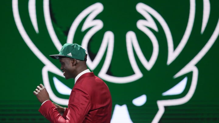 Jun 23, 2016; New York, NY, USA; Thon Maker walks to the stage after being selected as the number ten overall pick to the Milwaukee Bucks in the first round of the 2016 NBA Draft at Barclays Center. Mandatory Credit: Brad Penner-USA TODAY Sports