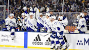 Feb 26, 2022; Nashville, Tennessee, USA; Tampa Bay Lightning players celebrate on the bench after beating the Nashville Predators in a Stadium Series ice hockey game at Nissan Stadium. Mandatory Credit: Christopher Hanewinckel-Imagn Images