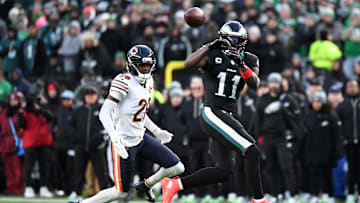 Nov 28, 2025; Philadelphia, Pennsylvania, USA; Philadelphia Eagles wide receiver A.J. Brown (11) makes a reception defended by Chicago Bears cornerback Nahshon Wright (26) during the second quarter of the game at Lincoln Financial Field. Mandatory Credit: Eric Hartline-Imagn Images
