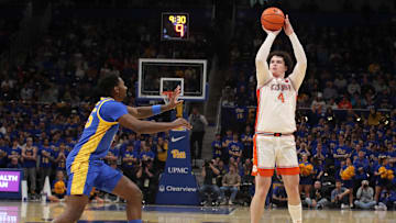 Jan 18, 2025; Pittsburgh, Pennsylvania, USA; Clemson Tigers forward Ian Schieffelin (4) shoots a three point basket against the Pittsburgh Panthers during the first half at the Petersen Events Center. Mandatory Credit: Charles LeClaire-Imagn Images