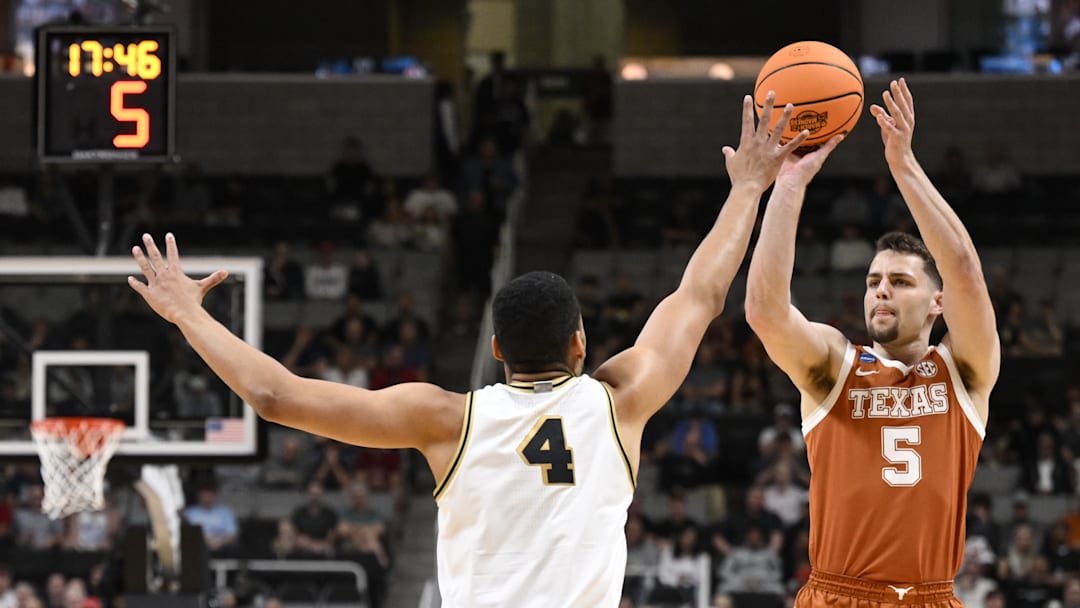 Mar 26, 2026; San Jose, CA, USA; Texas Longhorns forward Camden Heide (5) shoots over Purdue Boilermakers forward Trey Kaufman-Renn (4) in the first half during a Sweet Sixteen game of the West Regional of the men's 2026 NCAA Tournament at SAP Center. Mandatory Credit: Eakin Howard-Imagn Images