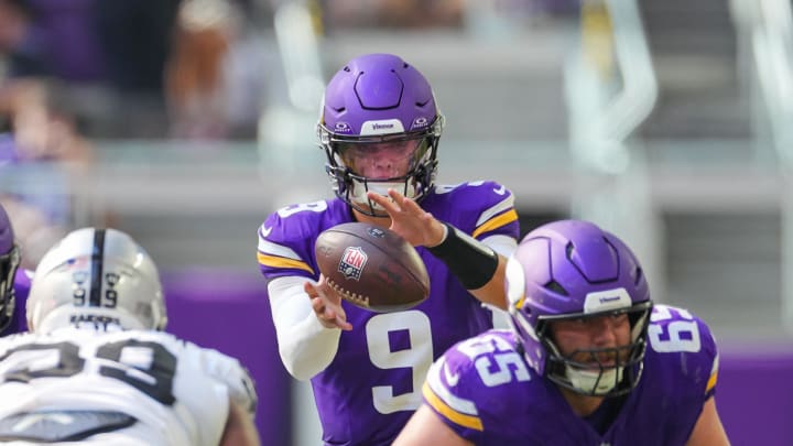 Aug 10, 2024; Minneapolis, Minnesota, USA; Minnesota Vikings quarterback J.J. McCarthy (9) takes the snap against the Las Vegas Raiders in the third quarter at U.S. Bank Stadium. Mandatory Credit: Brad Rempel-USA TODAY Sports