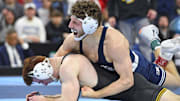 Mitchell Mesenbrink of the Penn State Nittany Lions celebrates his win vs. Michael Caliendo of the Iowa Hawkeyes during the 2025 NCAA Wrestling Championships. 