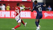 Jul 27, 2024; Inglewood, CA, USA;  Manchester United forward Marcus Rashford (10) controls the ball against Arsenal forward Reiss Nelson (24) during the first half at SoFi stadium. Mandatory Credit: Kiyoshi Mio-Imagn Images