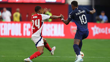 Jul 27, 2024; Inglewood, CA, USA;  Manchester United forward Marcus Rashford (10) controls the ball against Arsenal forward Reiss Nelson (24) during the first half at SoFi stadium. Mandatory Credit: Kiyoshi Mio-Imagn Images