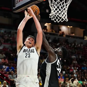 Jul 13, 2024; Las Vegas, NV, USA; San Antonio Spurs forward Ibrahima Diallo (53) blocks a shot attempt by Portland Trail Blazers center Donovan Clingan (23) during the fourth quarter at Thomas & Mack Center. Mandatory Credit: Stephen R. Sylvanie-Imagn Images