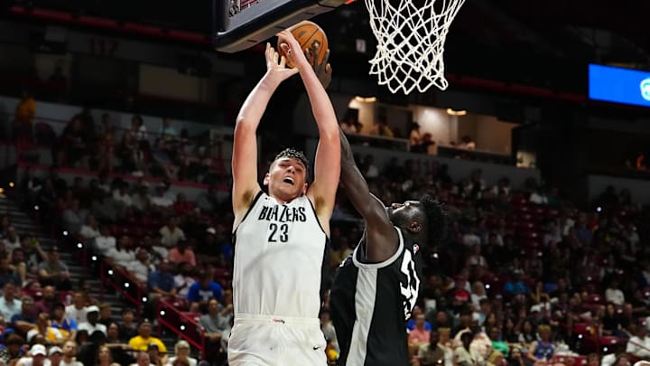 Jul 13, 2024; Las Vegas, NV, USA; San Antonio Spurs forward Ibrahima Diallo (53) blocks a shot attempt by Portland Trail Blazers center Donovan Clingan (23) during the fourth quarter at Thomas & Mack Center. Mandatory Credit: Stephen R. Sylvanie-Imagn Images