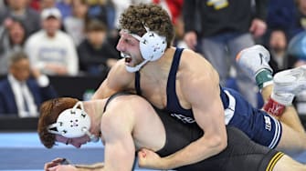 Mitchell Mesenbrink of the Penn State Nittany Lions celebrates a win against Michael Caliendo of the Iowa Hawkeyes during the 2025 NCAA Wrestling Championships.